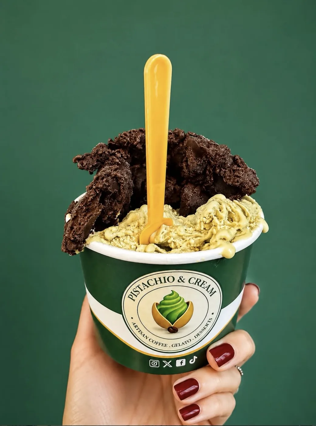 Pistachio Etna gelato with chocolate in a Pistachio & Cream cup